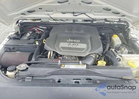 2012 Jeep Wrangler Unlimited Sport z USA, uszkodzony, nr VIN 1C4BJWDG4CL140250